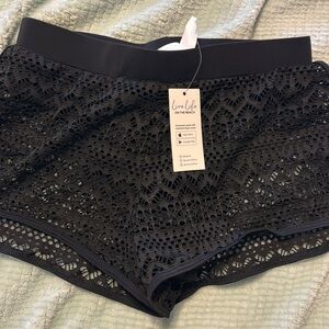 Lace swim shorts. Black never worn size small with tags